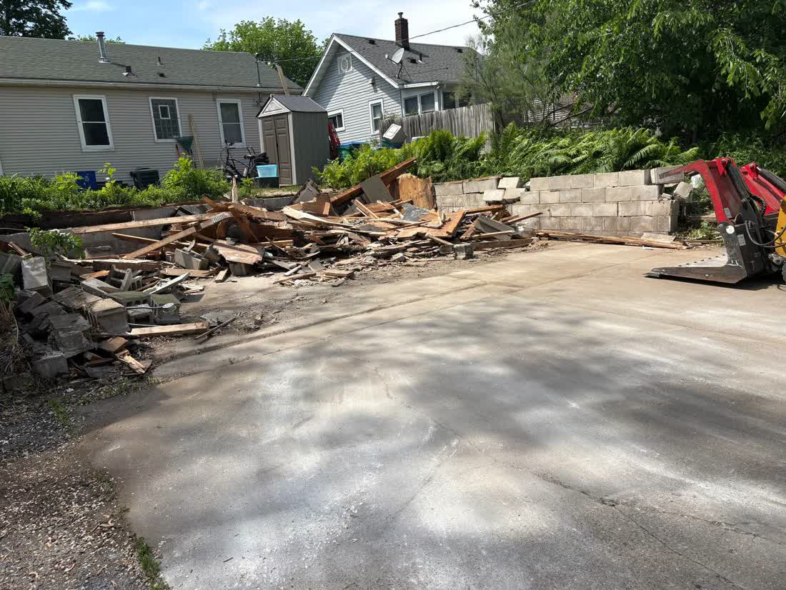Deck and shed demolition debris staged for haul-off in Minneapolis