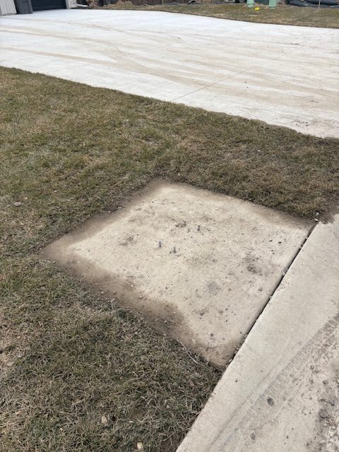 Concrete slab removal next to driveway Minneapolis MN