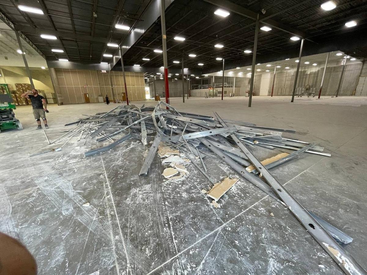 Commercial warehouse interior demolition Minneapolis MN — steel stud framing strip-out